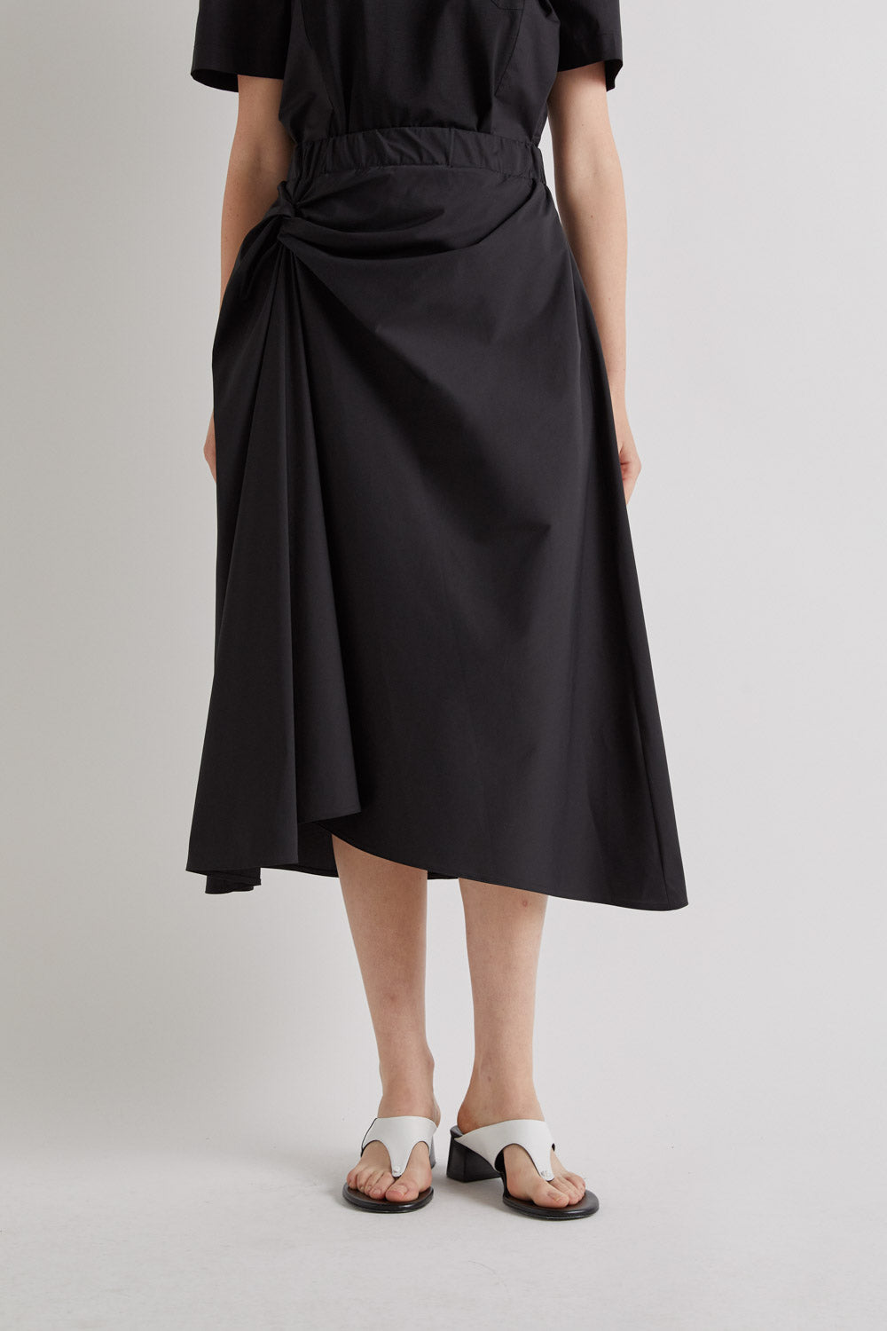 ASYMMETRICAL MIDI SKIRT - BLACK