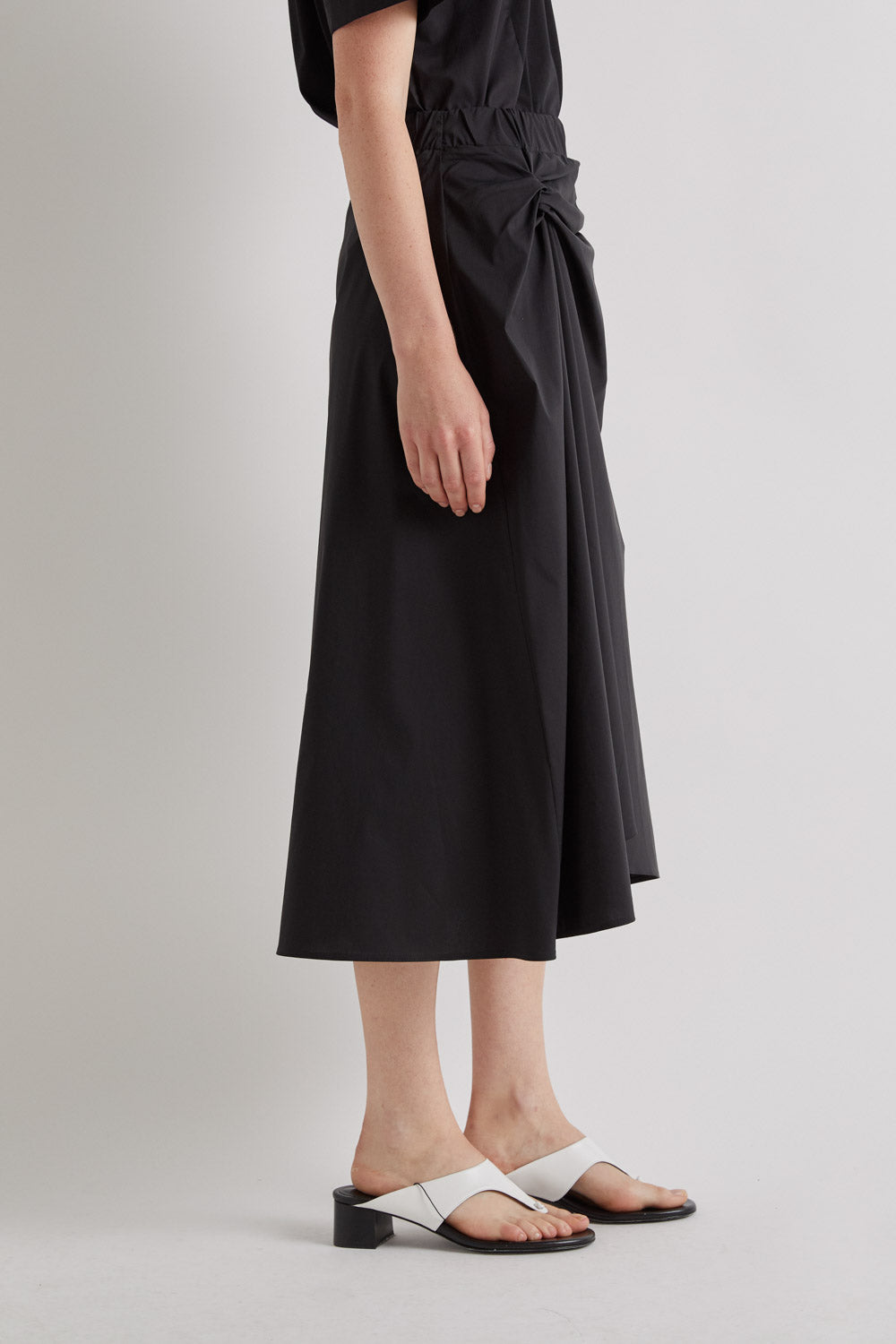 ASYMMETRICAL MIDI SKIRT - BLACK